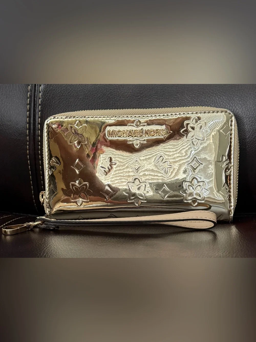 Michael Kors Gold Metallic Floral Embossed Wristlet Clutch New Without Tag.
